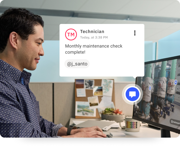 Man in front of computer with a Matterport model on it